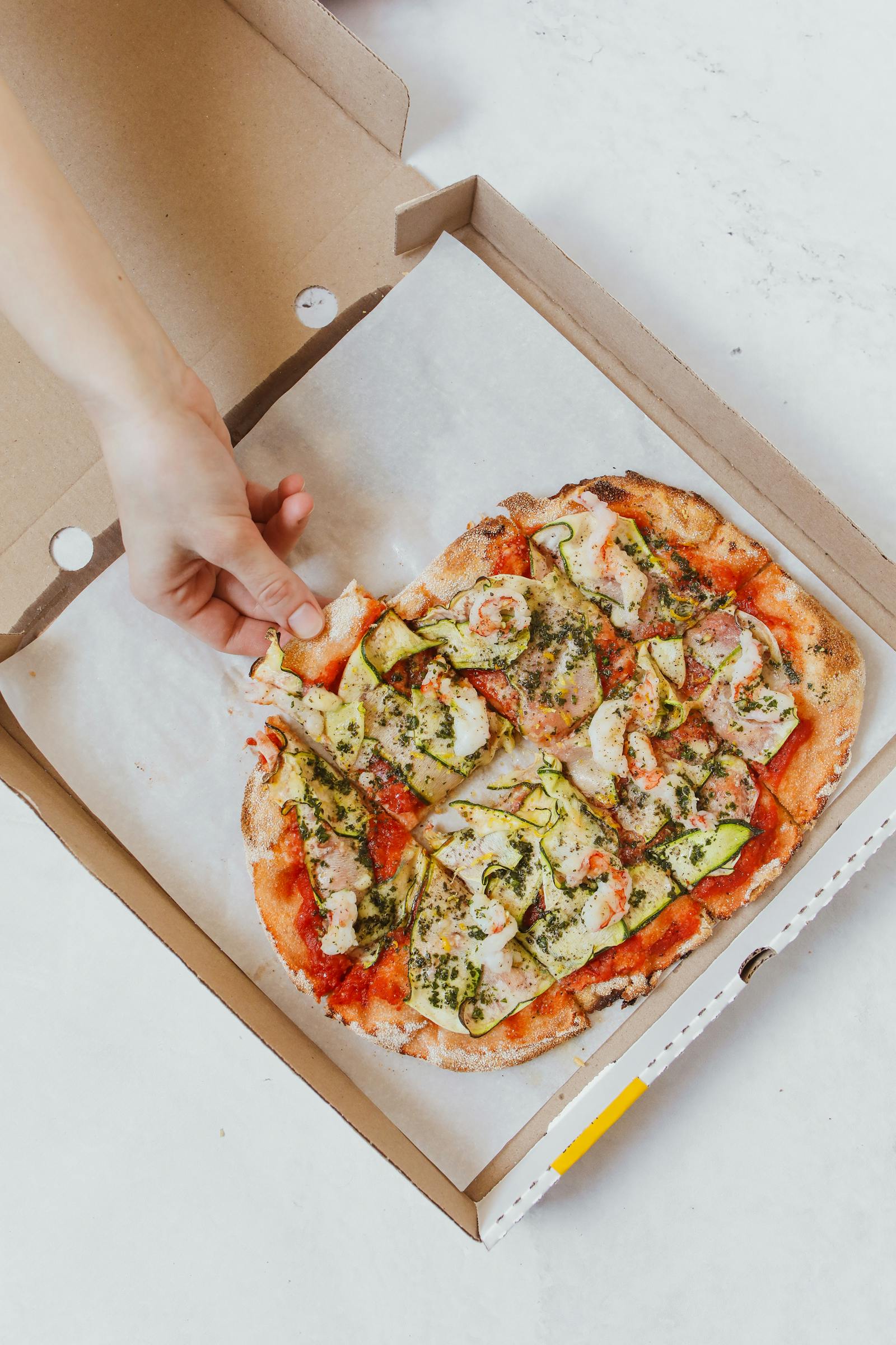 Top view of pizza in a box